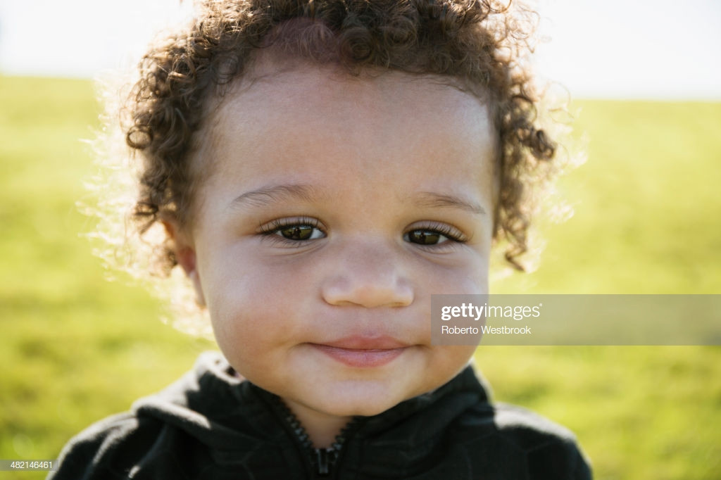 Mixed Baby Boy With Curly Hair
 Close Up Mixed Race Baby Boy With Curly Hair Stock