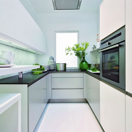 Modern Small Kitchen
 Small kitchen with reflective surfaces