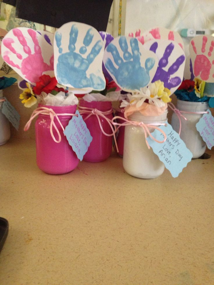 Mother's Day Gifts From Infants
 Mason jar toddler hand prints for Mother s Day