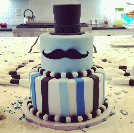 Mustache Birthday Cakes
 Mustache Cake top hat as top layer and solid blue with