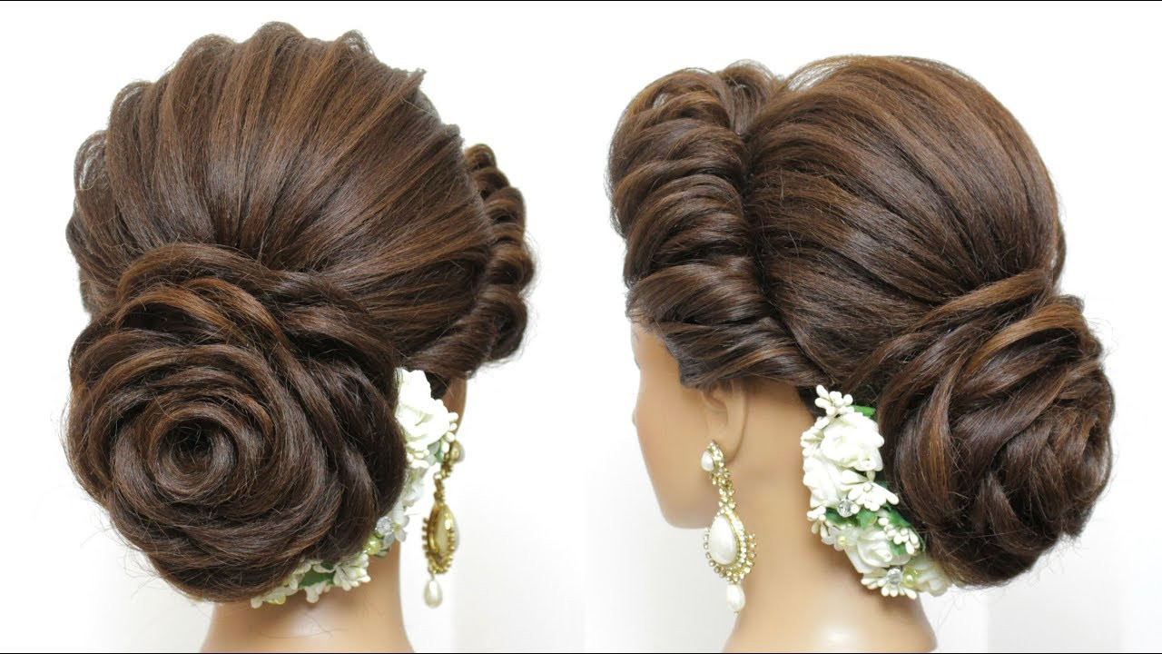 New Hairstyle For Wedding
 New Bridal Hairstyle With Flower Bun For Long Hair