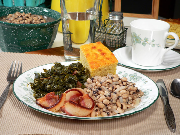 New Year Day Dinner Traditions
 So WHY EAT Hog Jowl Black Eye Peas Collard Greens and