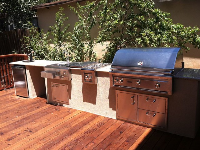 Outdoor Kitchen On Wood Deck
 Wood Deck and Outdoor Kitchen at Rianda