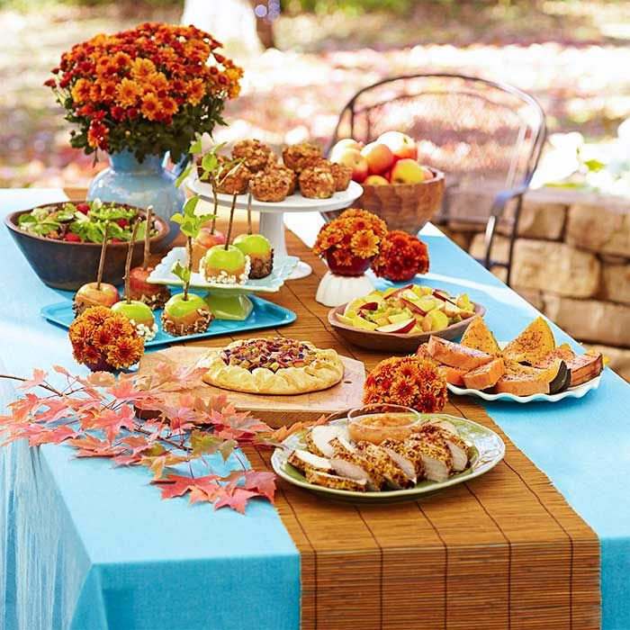 Party Food Table Ideas
 Table filled with harvest party food and table decorations