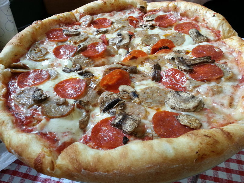 Pepperoni And Sausage Pizza
 In search of the perfect pizza Slice of NY Pizzeria