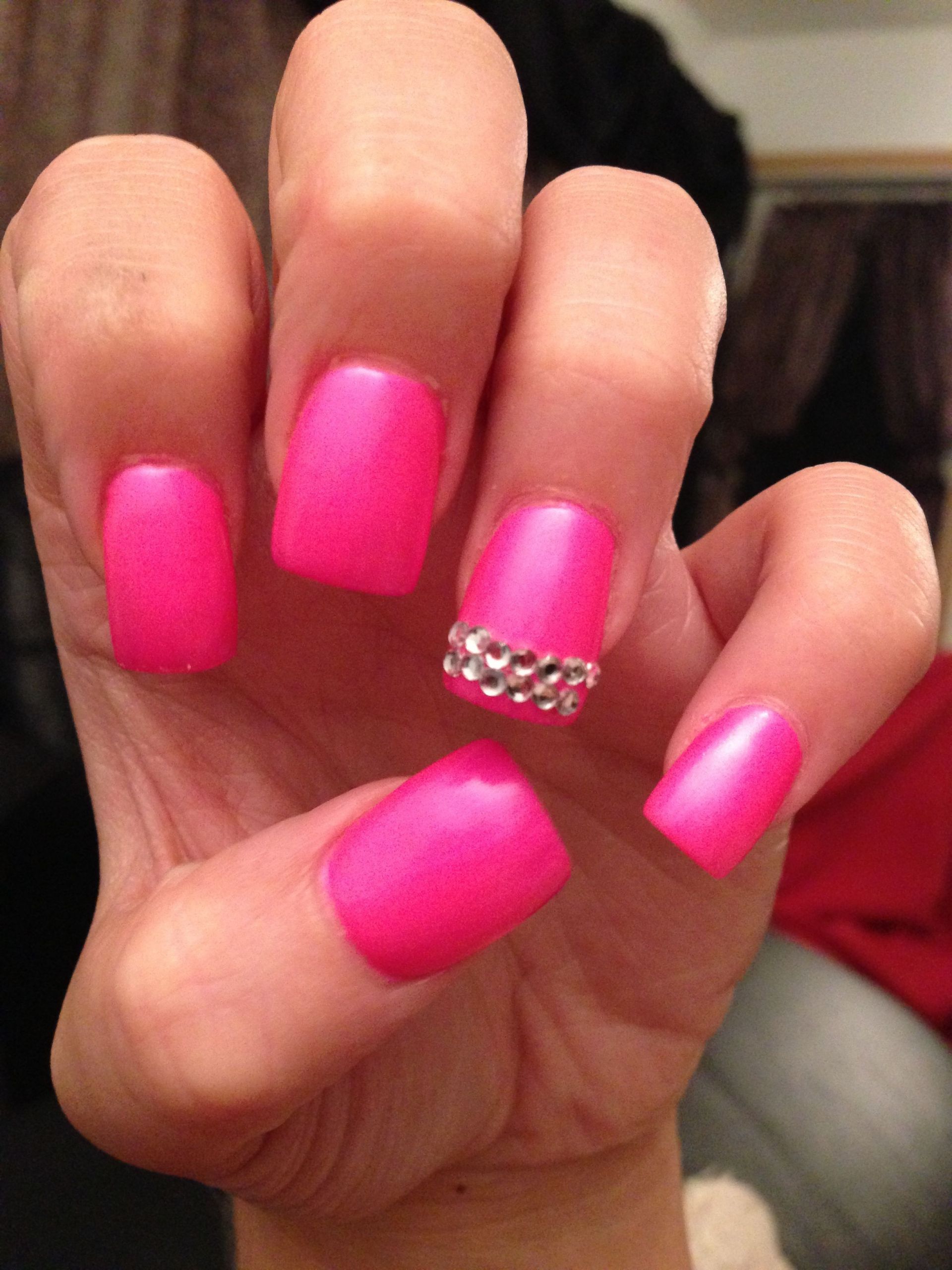 Pink Nail Designs With Rhinestones
 Neon bright pink nails with rhinestones