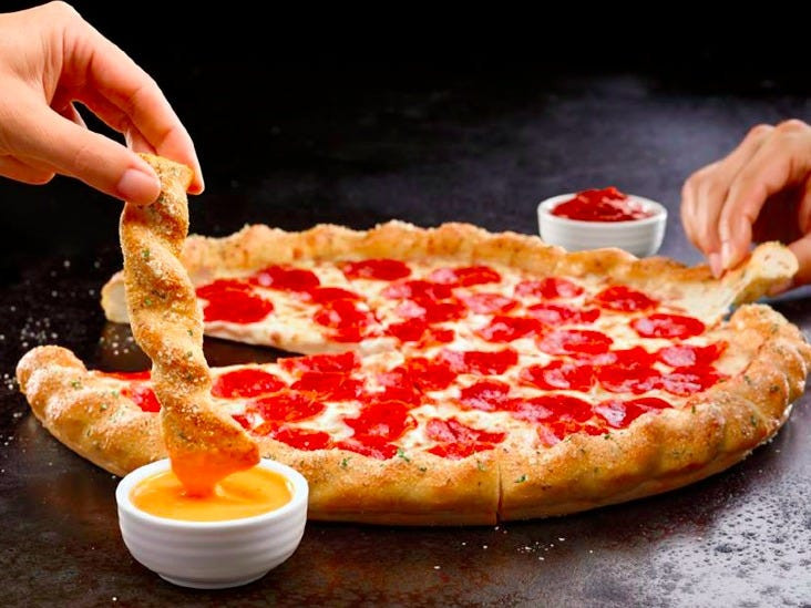 Pizza Hut New Crusts
 Pizza Hut unveils a breadstick crust Business Insider