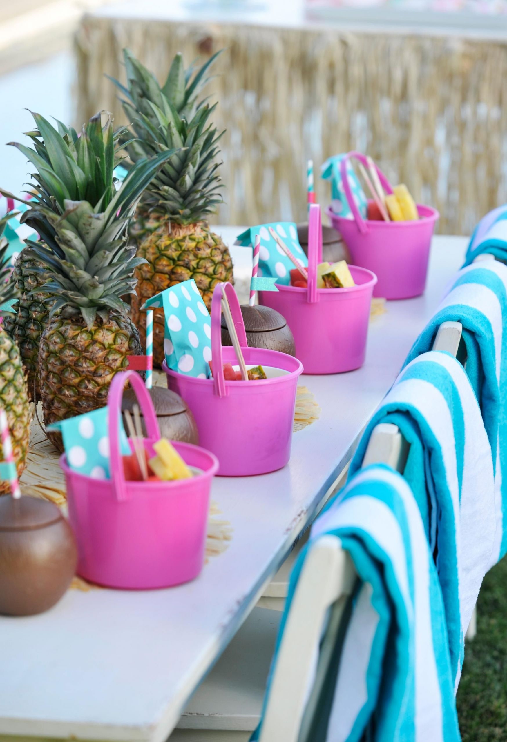 Pool Party Ideas For Birthdays
 Kids Pool Party Table with Pineapple Centerpieces