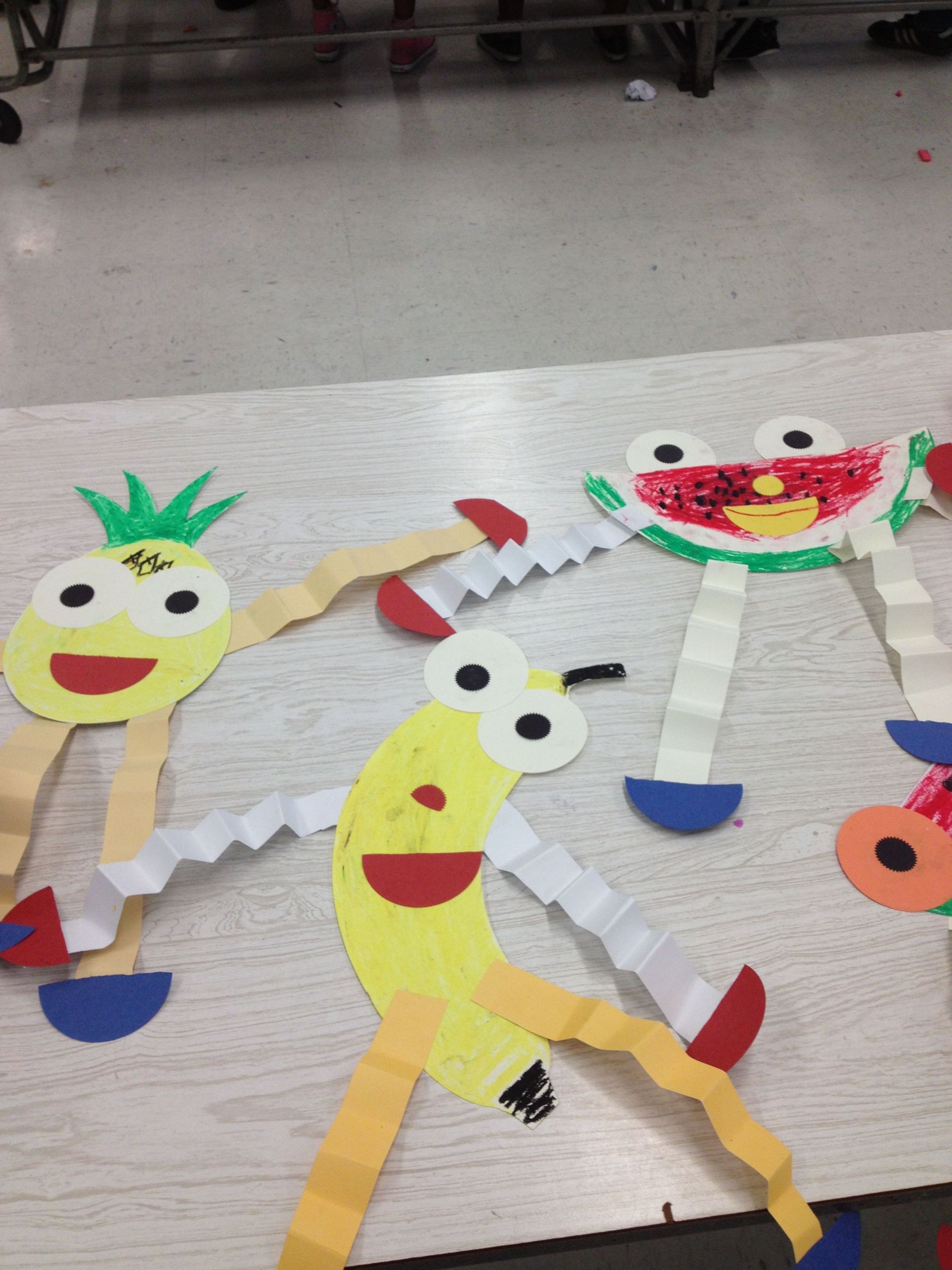 Preschool Craft Activities
 Making paper Fruit puppets teaching preschoolers the