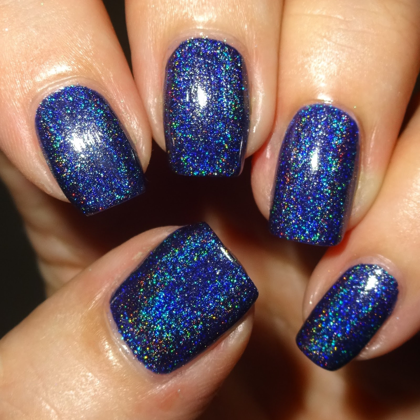 Pretty Blue Nails
 Wendy s Delights Navy Blue Holographic Nail Polish from