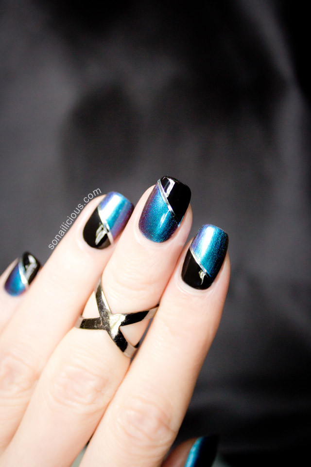 Pretty Blue Nails
 beautiful blue and black two toned nails SoNailicious