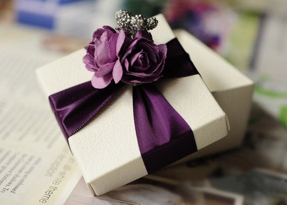 Purple Wedding Favors
 White Wedding Favor Candy Box with purple ribbon by