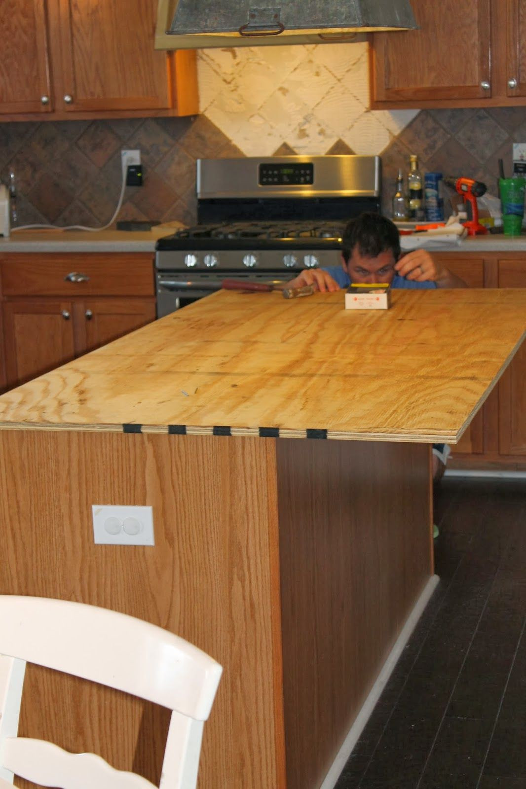 Reclaimed Wood Countertops DIY
 install new plywood base for faux reclaimed wood