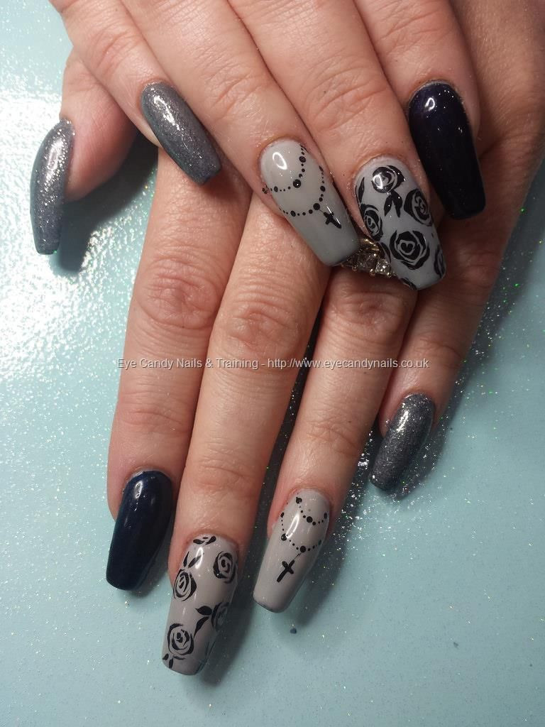 Rosary Nail Designs
 Black and grey gel polish with freehand roses and rosary