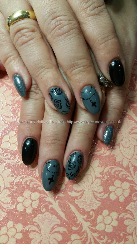 Rosary Nail Designs
 Grey gel polish with charcoal glitter and freehand rose