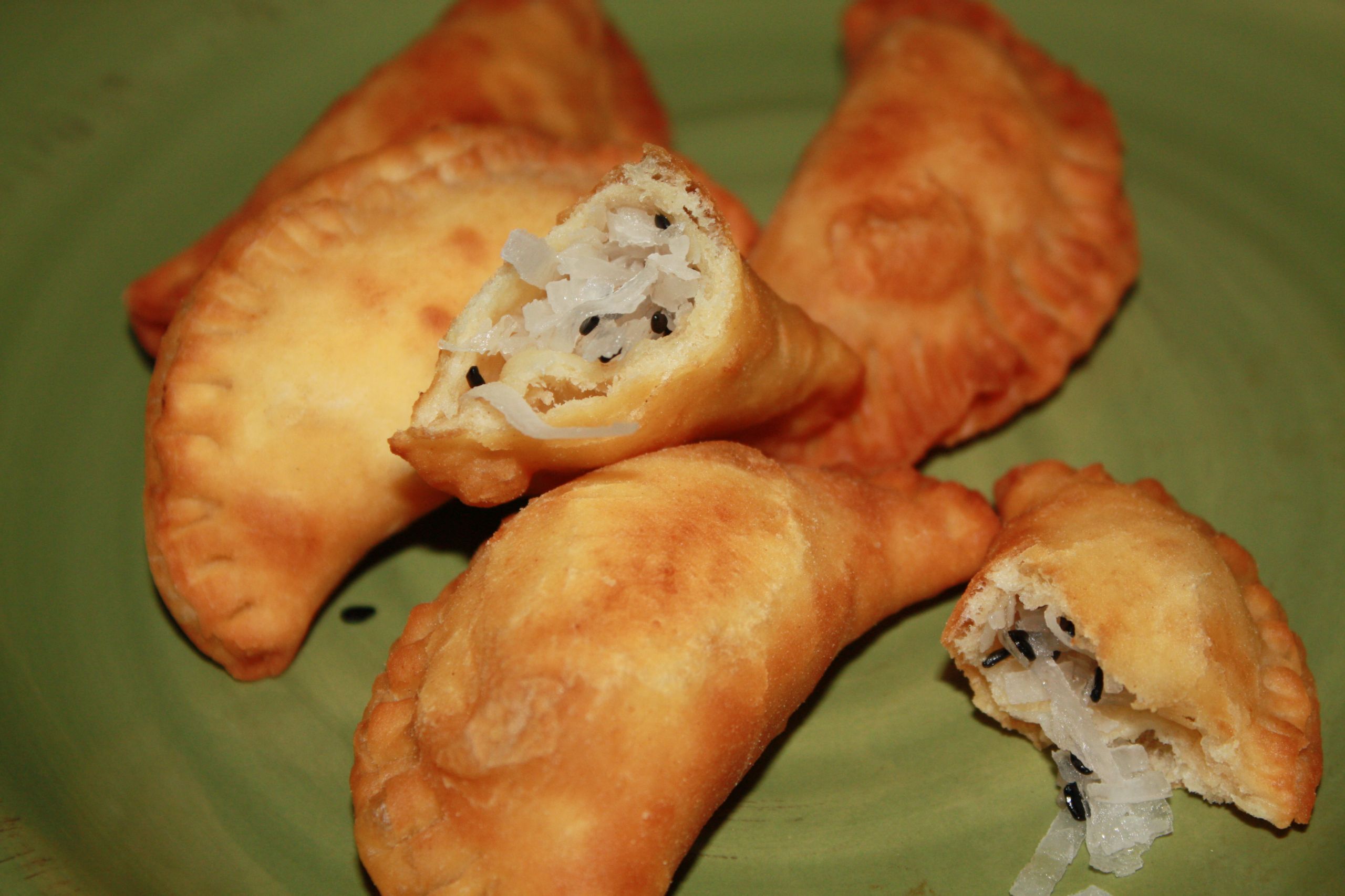 Savory Indian Pastries
 South African Poli…this is a pastry stuffed with coconut