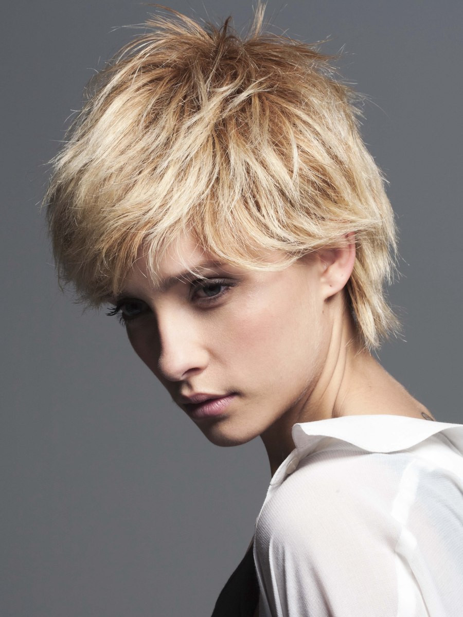 Short Feminine Haircuts
 Feminine boy cut with the cropped hair layered in the neck