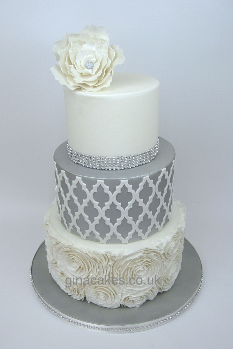 Silver And White Wedding Cakes
 Silver & White Wedding Cake With Contrasting lay And