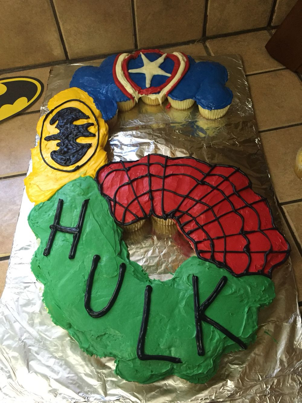Six Year Old Birthday Party Ideas
 Superhero cake made from cupcakes for a 6 year old s