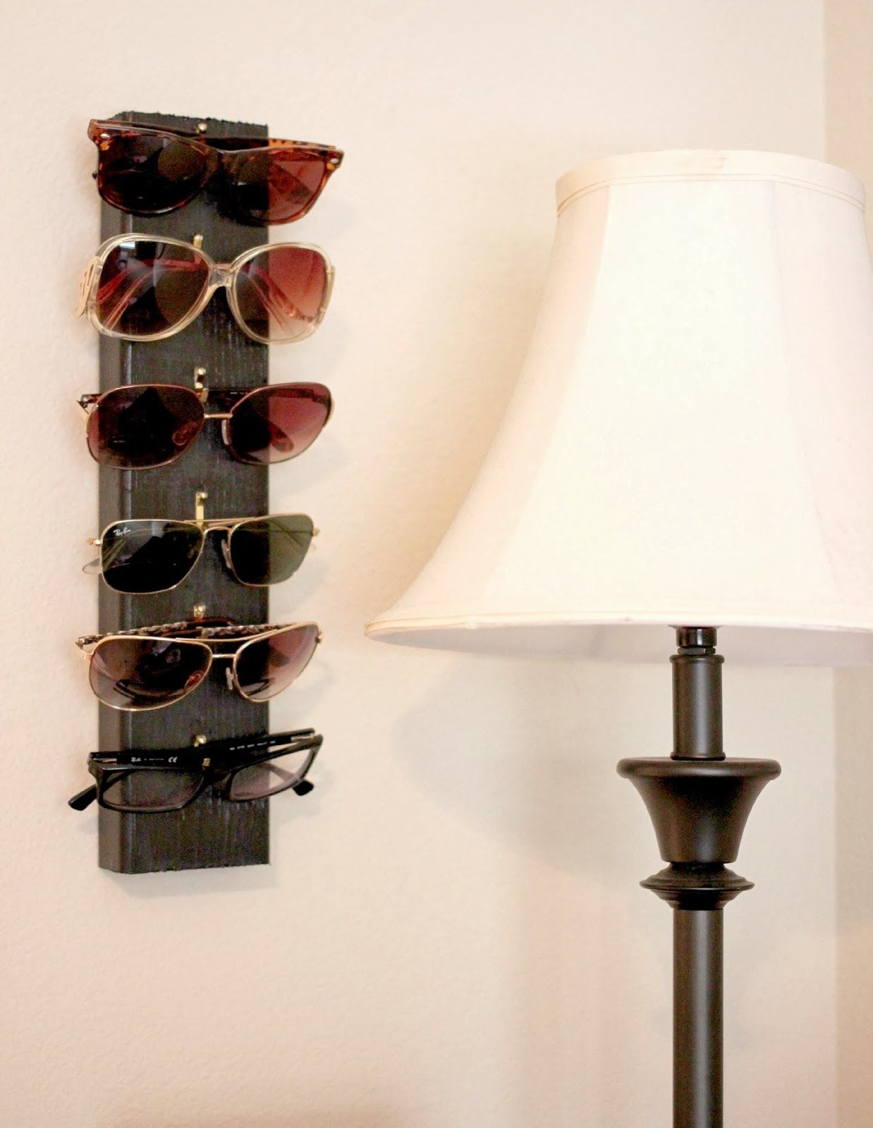 Sunglass Organizer DIY
 An easy diy project to hang all your sunglasses you just