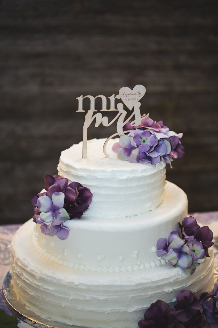 Two Tier Wedding Cake
 Two Tier White Wedding Cake With Purple Flowers