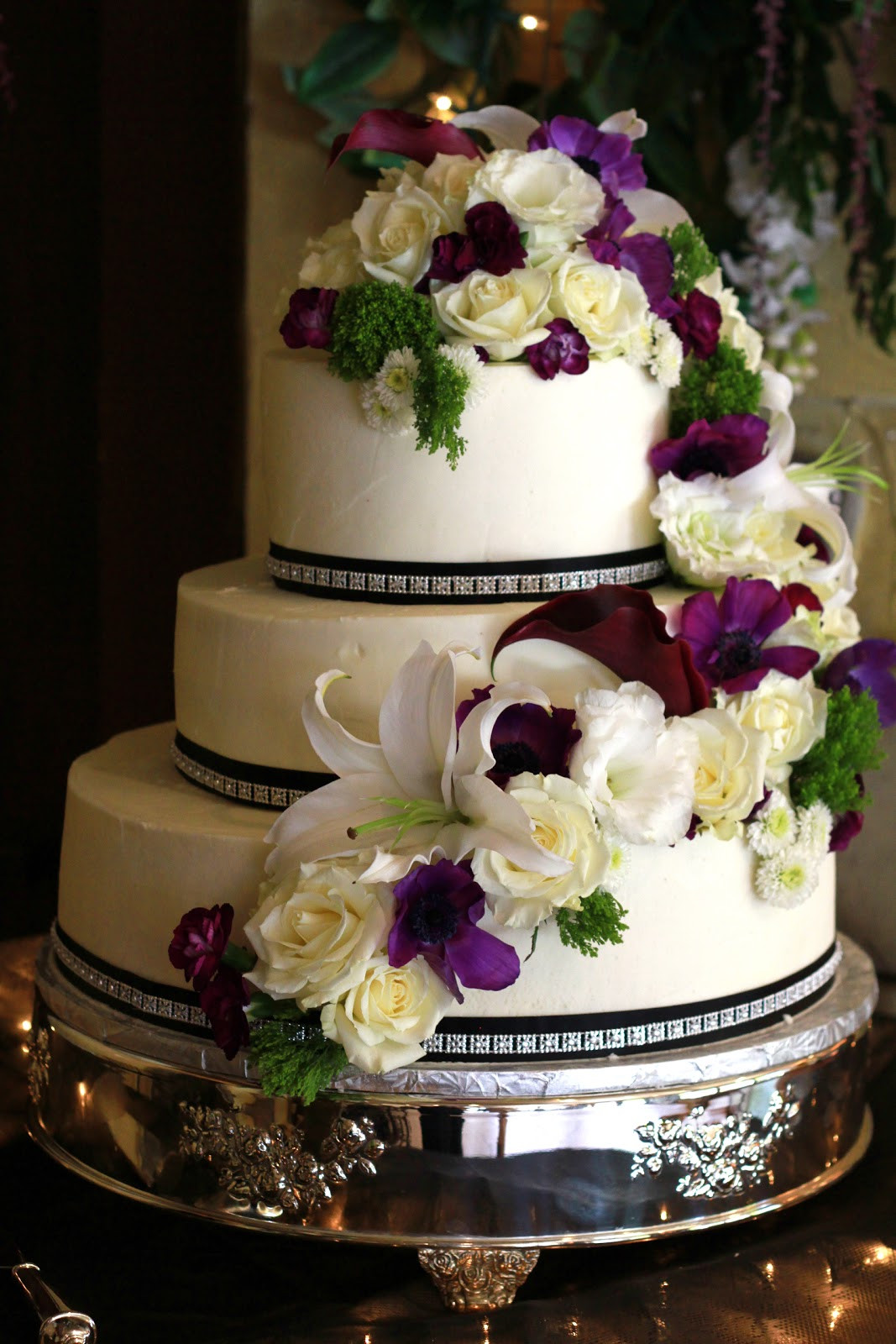 Wedding Cake
 Exquisite Cookies 3 Tier wedding cake with fresh flowers
