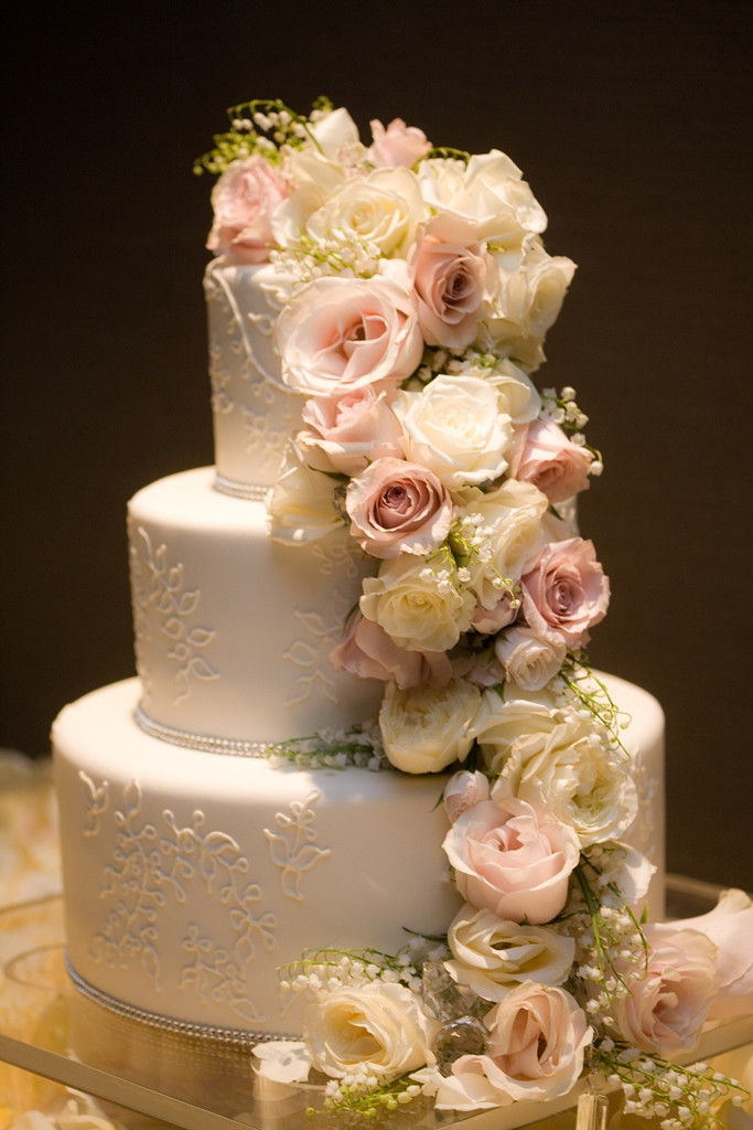 Wedding Cake With Flowers
 cocoa & fig Traditional Wedding Cake with Cascading