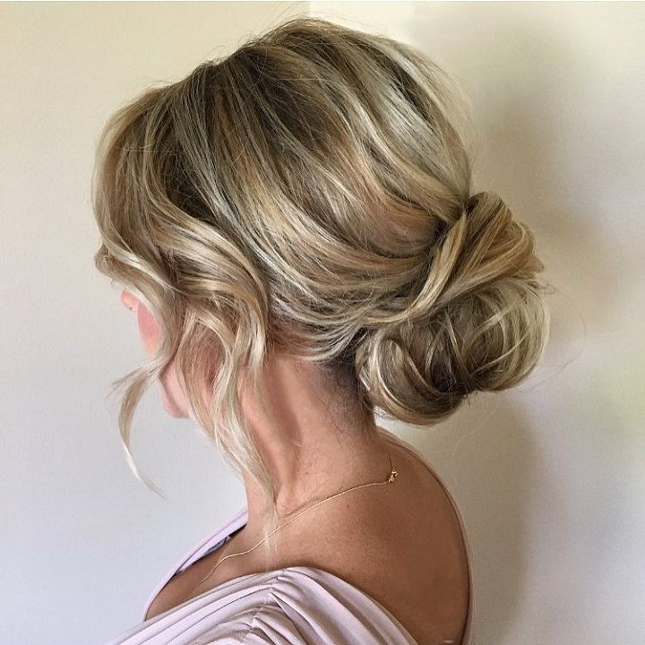 Wedding Hairstyles Low Buns
 Soft and textured low bun bridal hairstyle