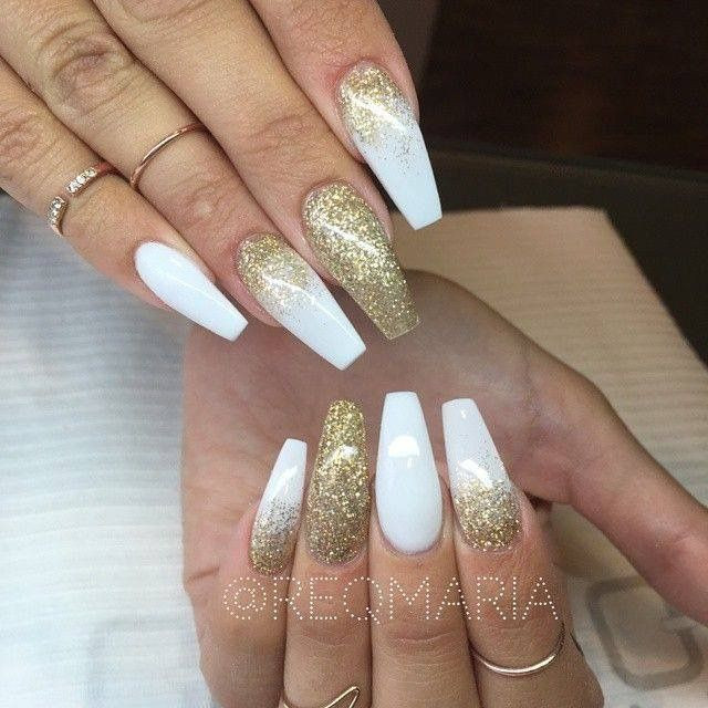 White Nails With Gold Glitter
 White and gold glitter long coffin nails