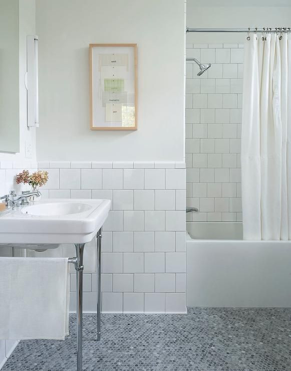 White Square Tile Bathroom
 White and gray bathroom features off white paint on upper