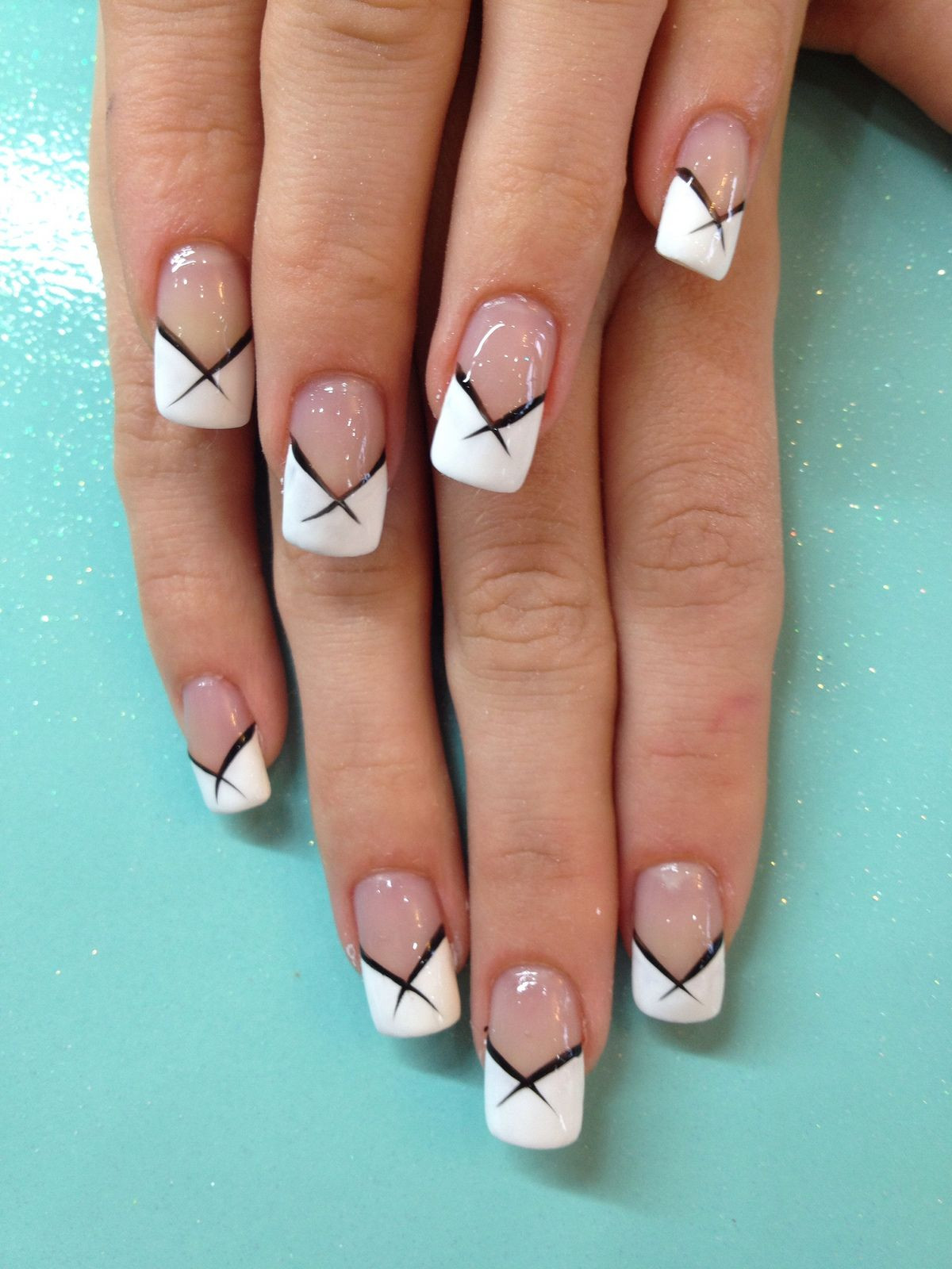 White Tips Nail Art
 Cool White French tips with black flick nail art