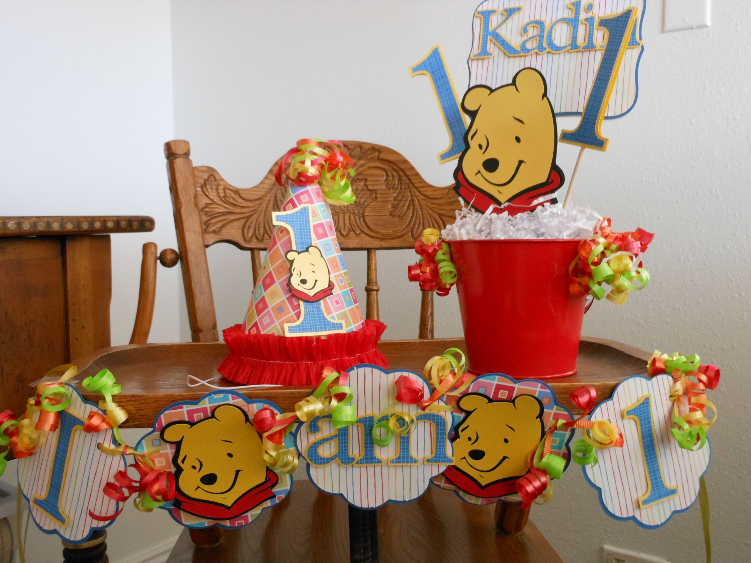 Winnie The Pooh 1st Birthday Decorations
 Winnie the Pooh 1st Birthday Party from A Sweet