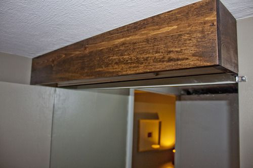 Wood Bathroom Light Fixtures
 Hide Hollywood lamps in bathroom using a DIY wood valence