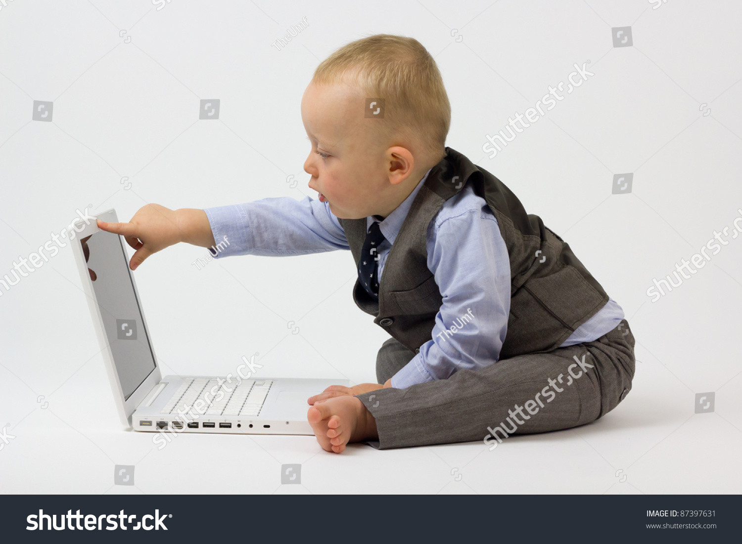 Work Work Fashion Baby
 A Cute Baby Boy Is Dressed In Smart Business Clothes And