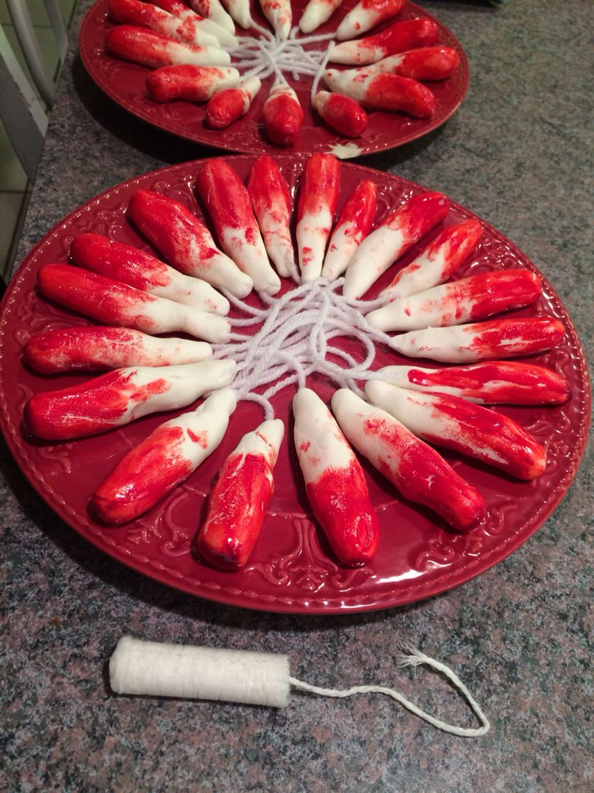 Grossest Halloween Food
 Gross Halloween food Bloody tampons made with fondant