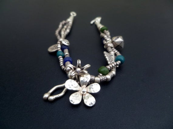 One Of A Kind Bracelet
 e of a Kind Sterling Silver Beaded Charm Bracelet by