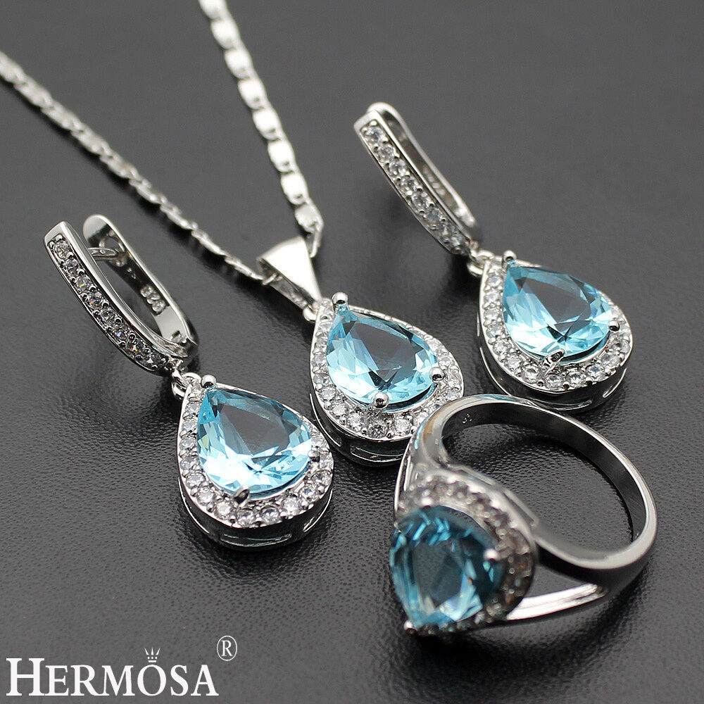 Silver Diamond Earrings
 HERMOSA SETS WHITE & BLUE TOPAZ 925 STERLING SILVER