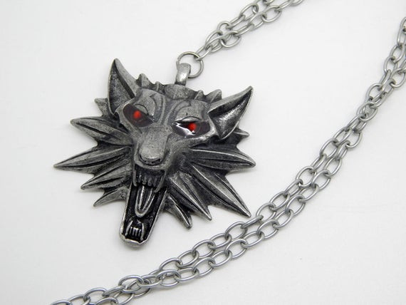 The Witcher Necklace
 Witcher medallion necklace wolf pendant red eyes geralt of